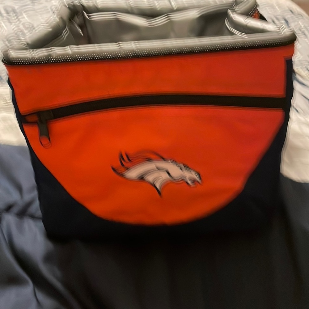 Brand new Denver broncos lunch pale it zips in front so you can store keys
